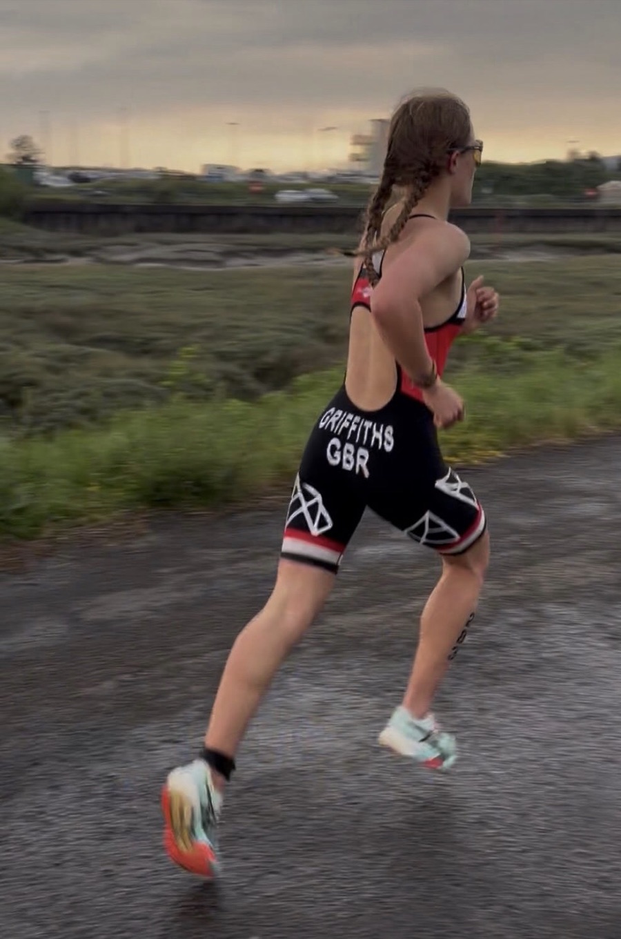 Betsy Griffiths running in a GB trisuit during a triathlon